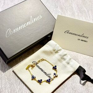 Commonlines - COMO LINK
BRACELET - 14K GOLD &
SAPPHIRE / Retail price $145